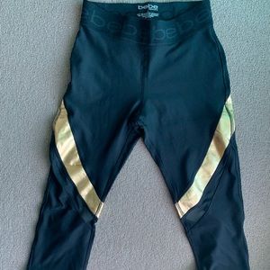 NEW BEBE black gold capris leggings SMALL gym running Pilates activewear yoga